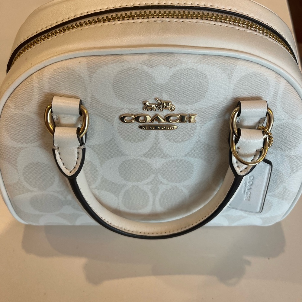 New with tags, white coach mini clutch crossbody